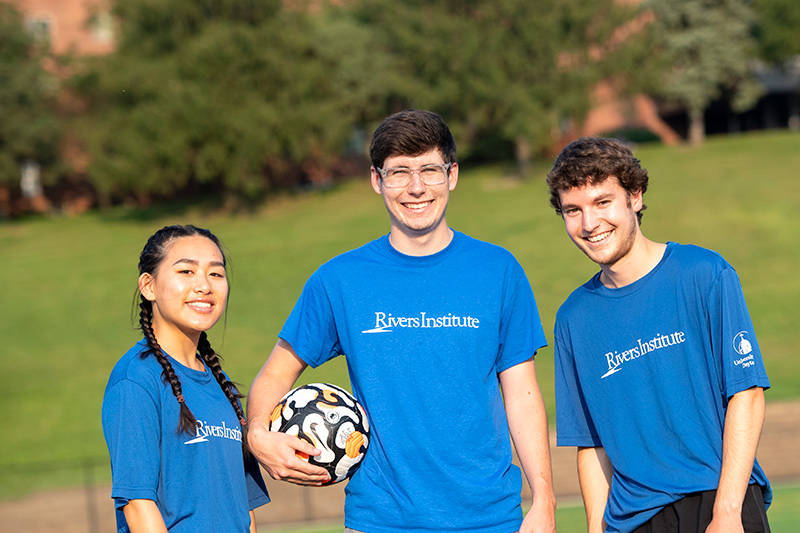 Students with a soccer ball