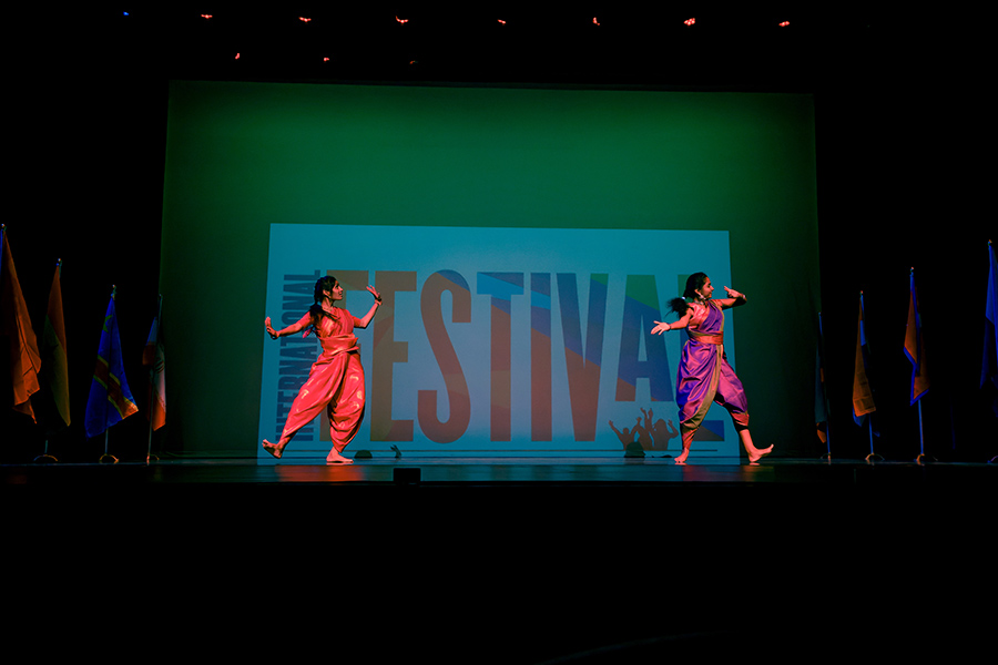 Students dancing on stage at the International Festival