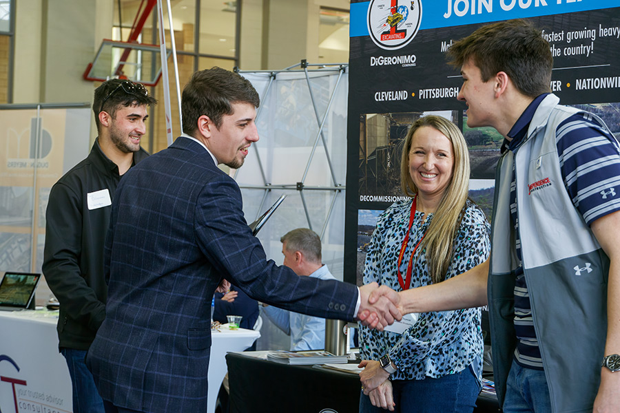 Students at a career fair on campus