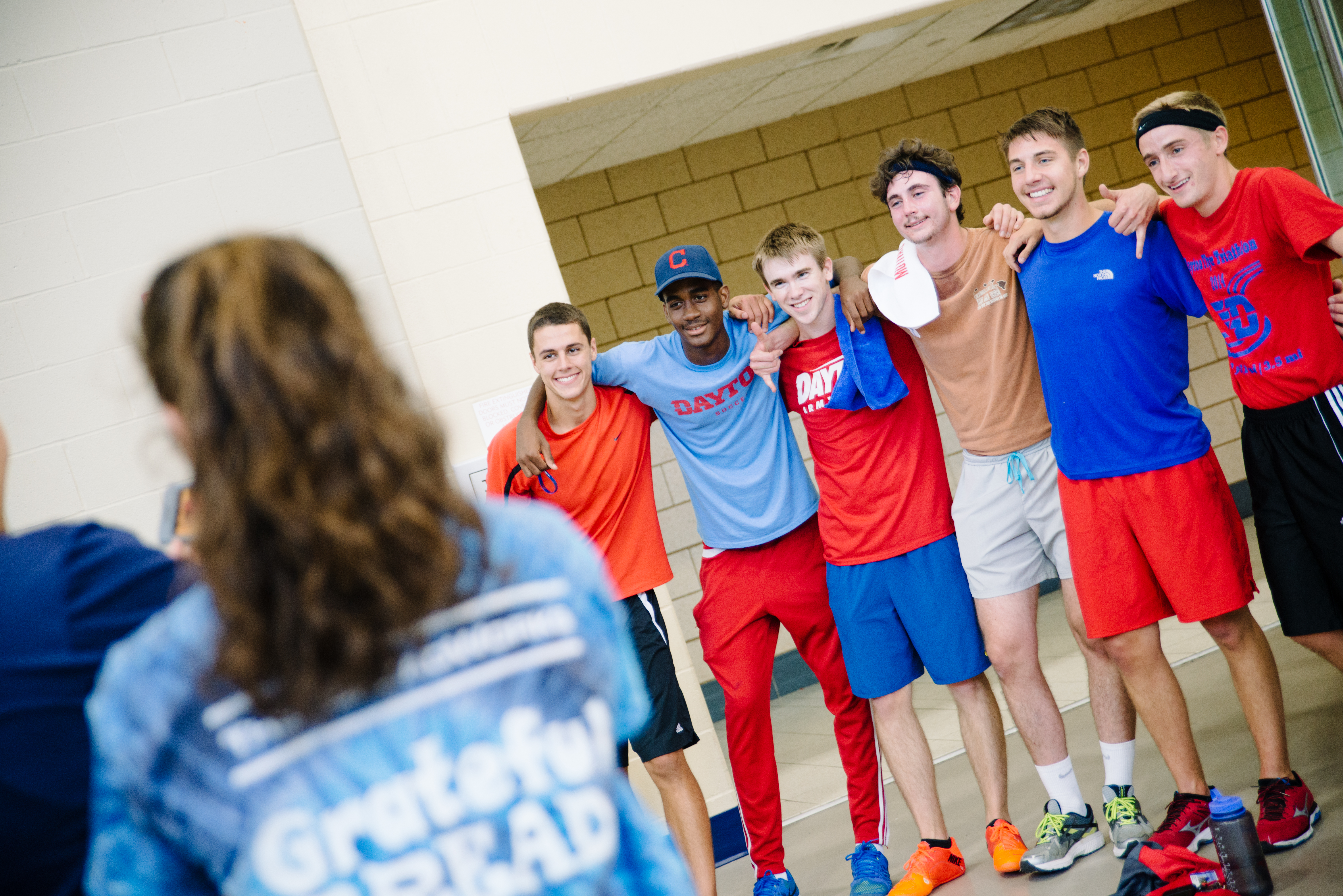 Group of students in UD gear smiling during an intramural competition